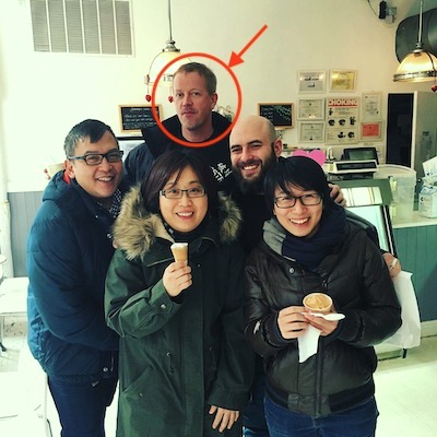 Group shot of Roy Zornow with coworkers at an ice cream store